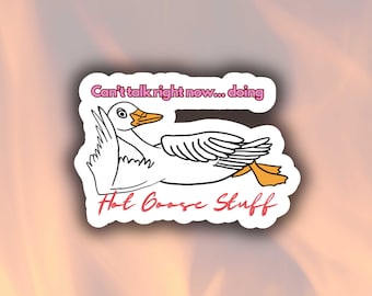 May include: A white sticker featuring a cartoon goose with orange feet and beak. The sticker has the text "Can't talk right now... doing" in pink above the goose, and "Hot Goose Stuff" in pink below.