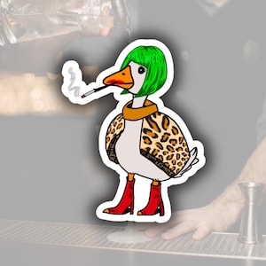 May include: A sticker featuring a cartoon duck with a green wig, orange beak, and red lipstick, wearing a leopard print jacket and red boots. The duck is smoking a cigarette. The sticker is white with a black outline.