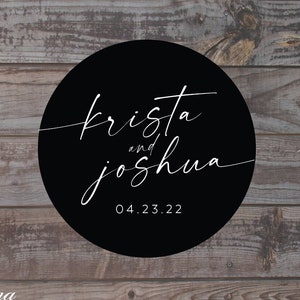 May include: Black and white wedding save the date announcement with the text "Krista and Joshua" and the date "04.23.22".