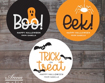 May include: Three round Halloween stickers with black and orange designs. The first sticker has a white ghost with the text "Boo! Happy Halloween from Isabella". The second sticker has a white spider with the text "eek! Happy Halloween from Isabella". The third sticker has three black bats with the text "Trick or Treat Happy Halloween from Isabella".
