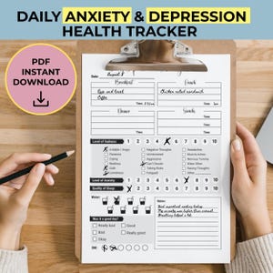 May include: A clipboard with a daily anxiety and depression health tracker. The form includes sections for meals, level of sadness, anxiety, sleep quality, water intake, and notes. Text on the form includes "PDF Instant Download".