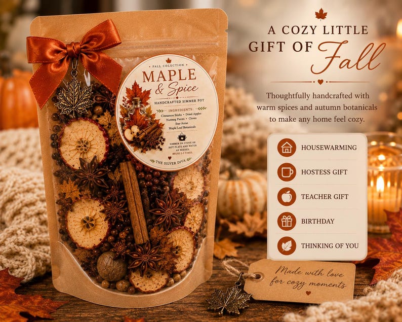 May include: A clear pouch of Maple & Spice simmer pot ingredients featuring dried apple slices, cinnamon sticks, star anise, and botanicals. The pouch is topped with a rust-coloured ribbon and a metal maple leaf charm, with a label detailing ingredients.