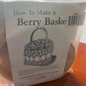 May include: A clear plastic bag containing a craft kit. The kit includes a printed label with the text "How To Make a Berry Baske" and an illustration of a woven basket. The label also includes text about the berry basket.