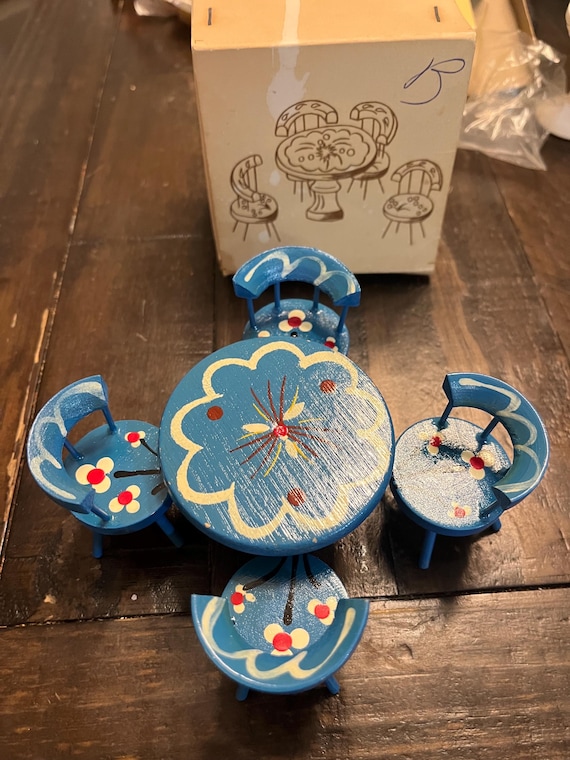 Vintage hand, painted five piece, doll house table with chairs. Blue with white and red floral design.