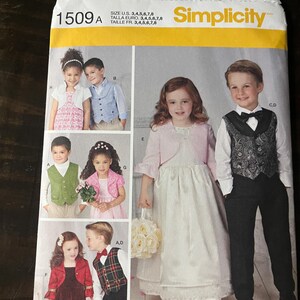 May include: Simplicity sewing pattern 1509A for children's clothing. The pattern includes instructions for making a vest, a bolero, and a dress. The pattern is available in sizes 3-8.