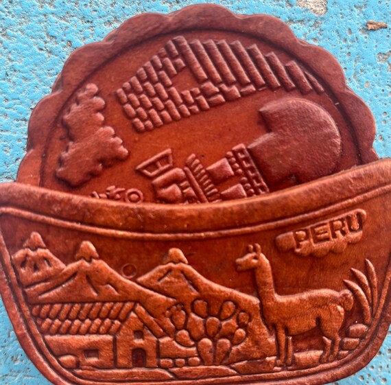 Handtooled Leather Coasters from Peru in a Standing Handtooled Holder