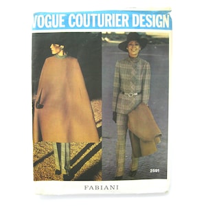 May include: Vogue Couturier Design pattern number 2591 by Fabiani. The pattern features two looks: a brown cape with a plaid pantsuit and a plaid pantsuit with a brown cape.