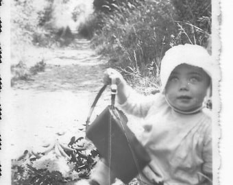 Vintage 1930/30s old French photography girl  playing with bag