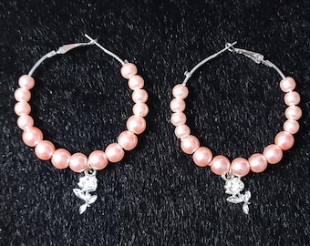 Baby pink hoop earrings with silver rose