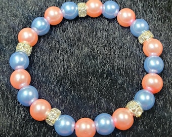 10 mm baby pink and baby blue stretch bracelet in Gamma Phi Delta colors