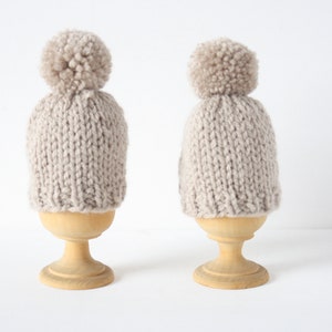 Set of two knitted egg cosies or egg warmers in pink, white, mustard, light green or taupe Taupe