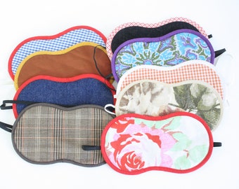 Sleeping masks in various colours and patterns for men and women