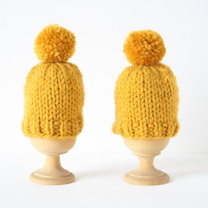 Set of two knitted egg cosies or egg warmers in pink, white, mustard, light green or taupe Mustard