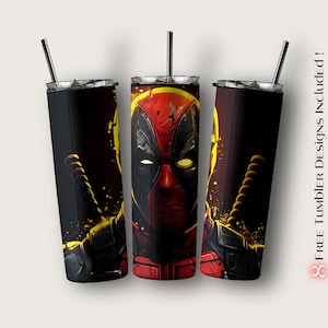 May include: Three stainless steel tumblers with a black and red Deadpool design. The tumblers have a black background with a red and yellow Deadpool character in the center. The tumblers are a popular choice for everyday use and can be personalized with a name or logo.