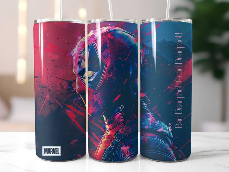 May include: Three stainless steel tumblers with a Deadpool design. The tumblers are blue, red, and black with a graphic of Deadpool's face and the text "Bad Deadpool - Good Deadpool!" on the blue tumbler. The red tumbler has the Marvel logo.