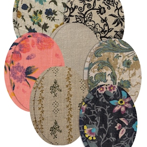 Può includere: Una collezione di sette toppe ovali in tessuto con vari disegni floreali e fantasia. I colori includono rosa, blu, nero e beige. Il testo "More colors & sizes available" è in basso.