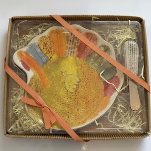 May include: A rustic wooden sign with the text "Welcome to our home" in white lettering. The sign features a distressed finish and a simple, inviting design, perfect for a front porch or entryway.