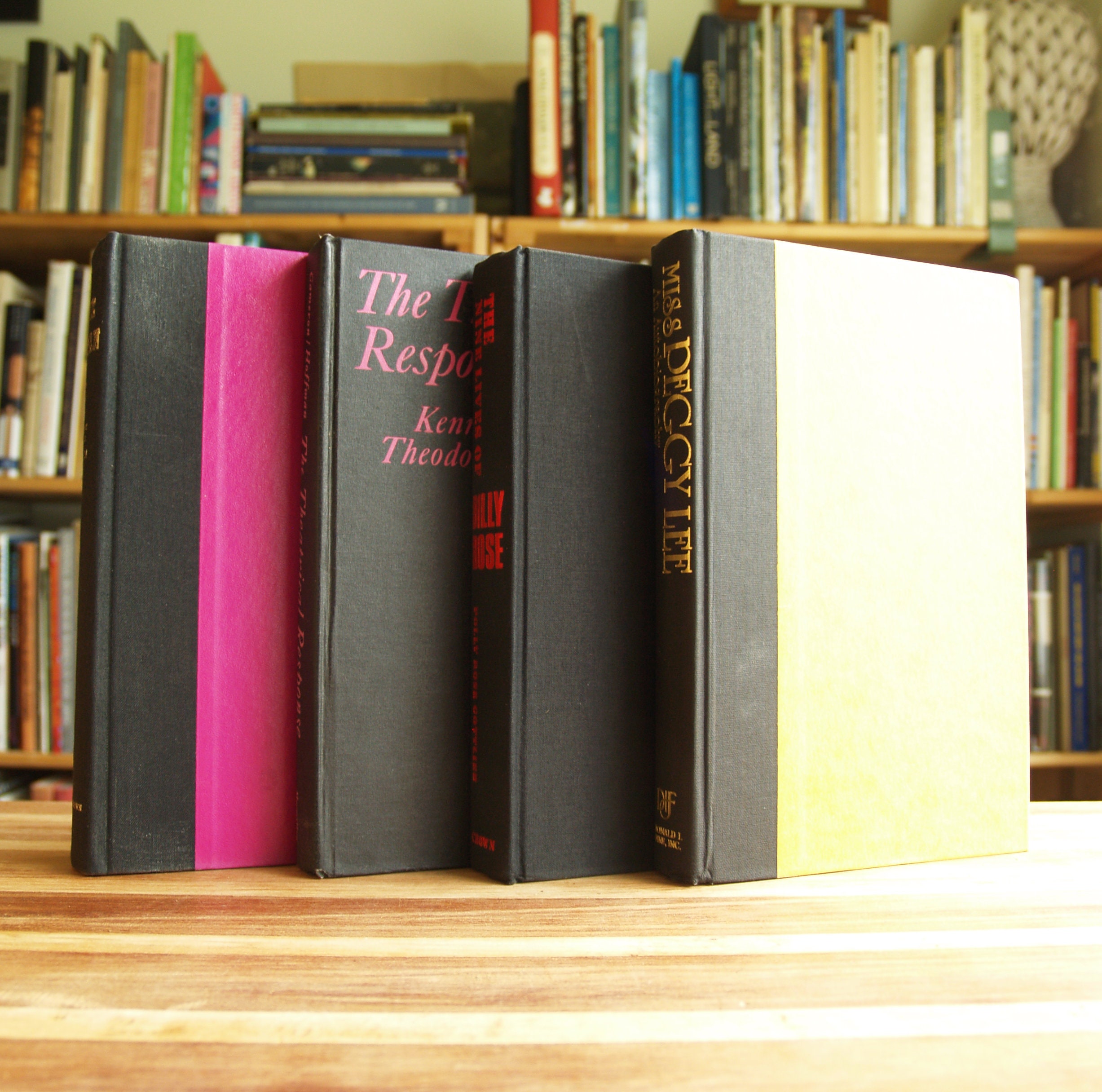 Collection of Ten Hardcover Books in Black Bindings With