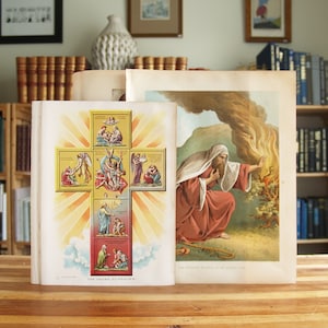 May include: Two vintage religious illustrations. The first shows a cross with scenes of prayer. The second shows a man in a red robe with a burning bush behind him. The text reads "The Cross of Prayer" and "The Appearance of God in the Burning Bush."