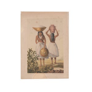 May include: Two women in traditional clothing, one carrying a bowl on her head and the other carrying a pot. The woman with the bowl is holding a round shield in her right hand. The women are standing in a field with green plants in the background.