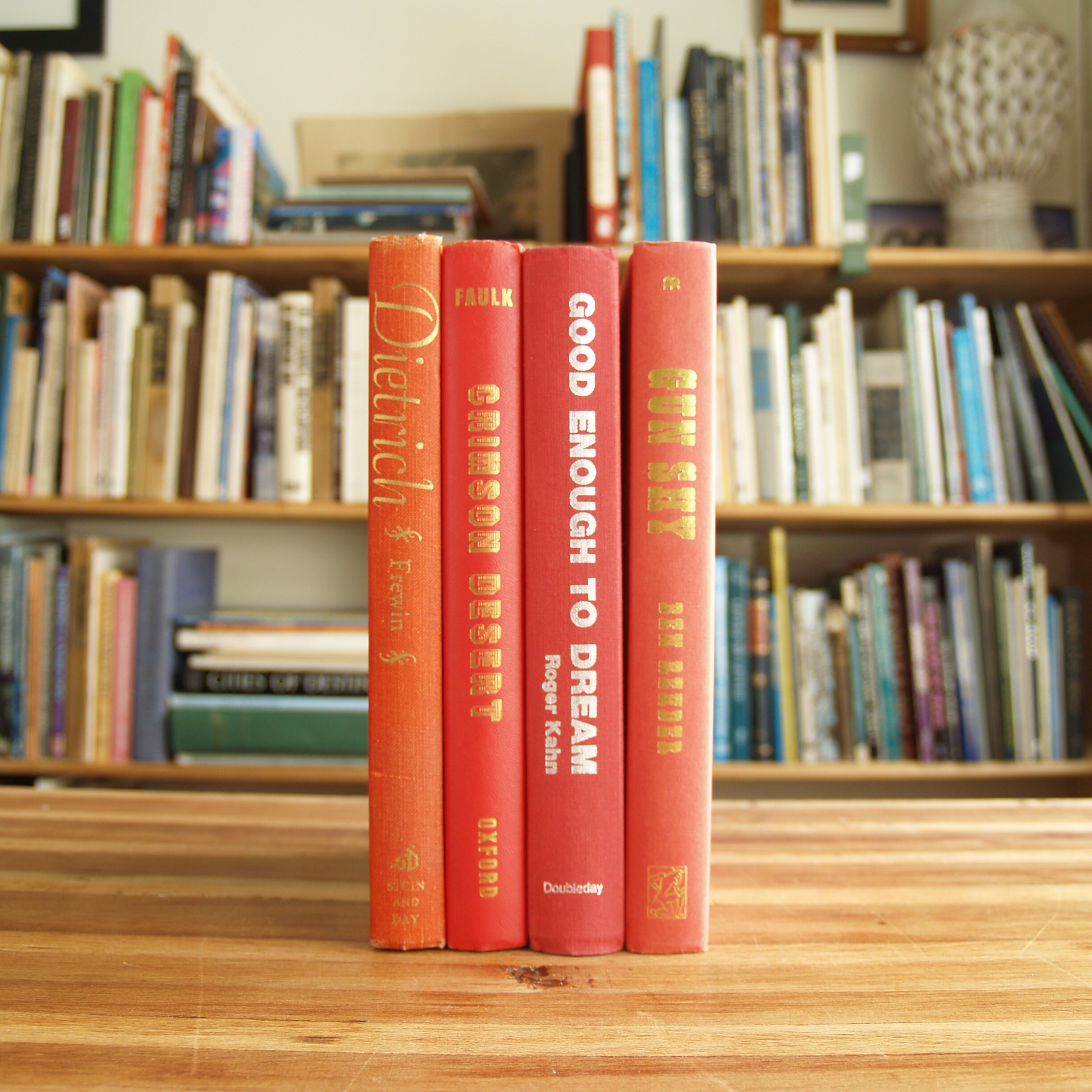 Decorative Collection of Eight Hardcover Books With Red