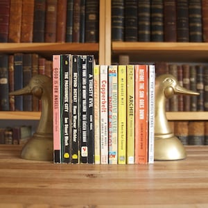 Twelve vintage paperback novels from the 1950s; romance, mystery, fiction etc. - Free US Shipping