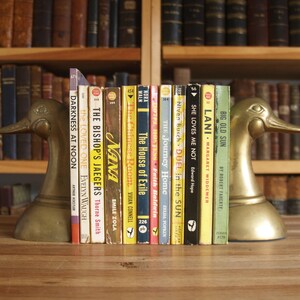 Twelve vintage paperback novels from the 1940s; romance, fiction etc. - Free US Shipping