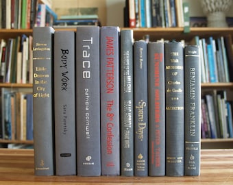 Collection of nine hardcover books with gray bindings - Free US Shipping