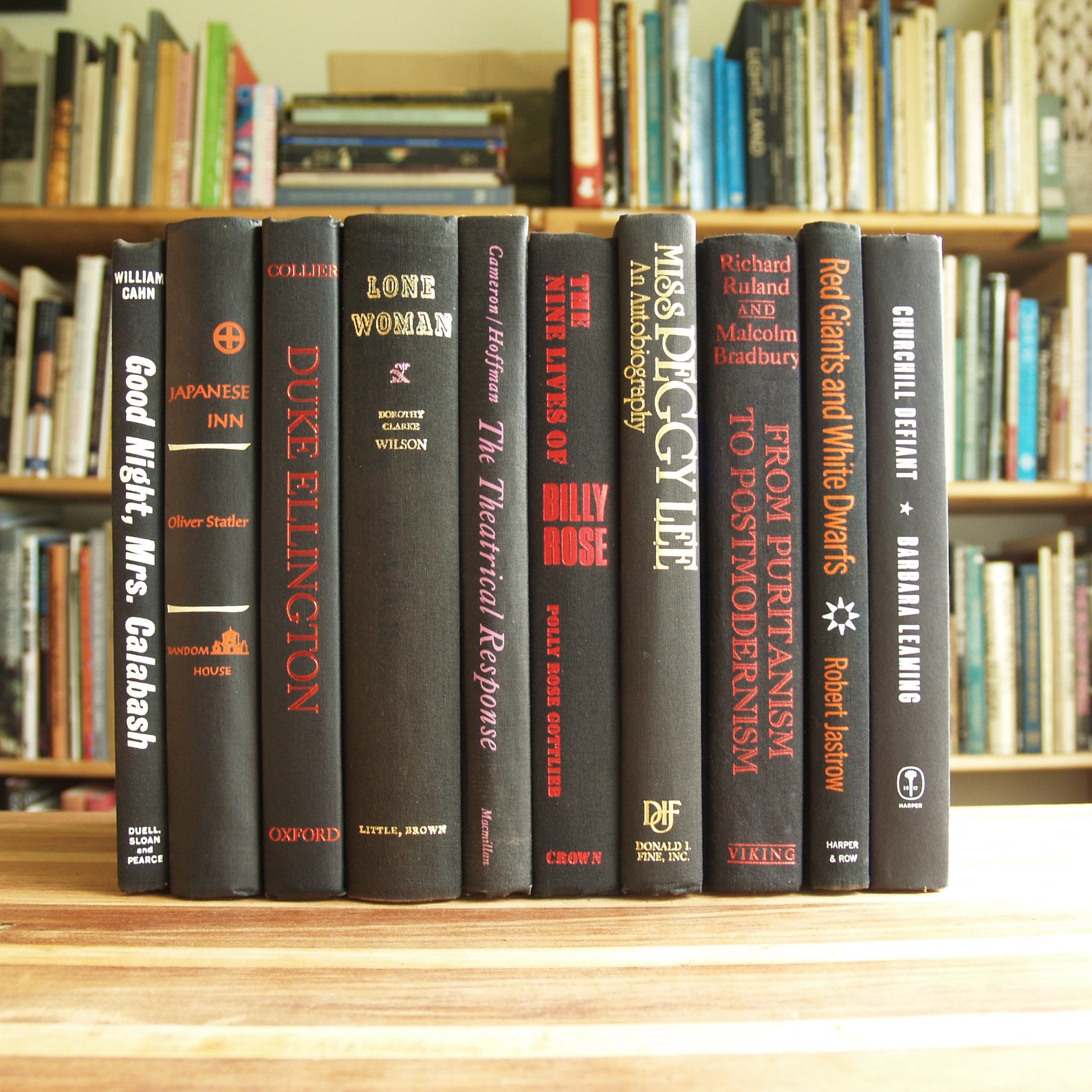 Collection of Ten Hardcover Books in Black Bindings With Multi-colored ...