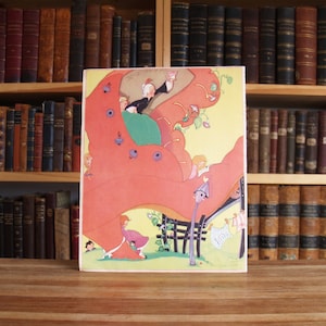 May include: A colorful vintage illustration of a whimsical scene with figures riding a large, red, organic-shaped structure. The artwork features a light yellow background, a green landscape, and a wooden fence.