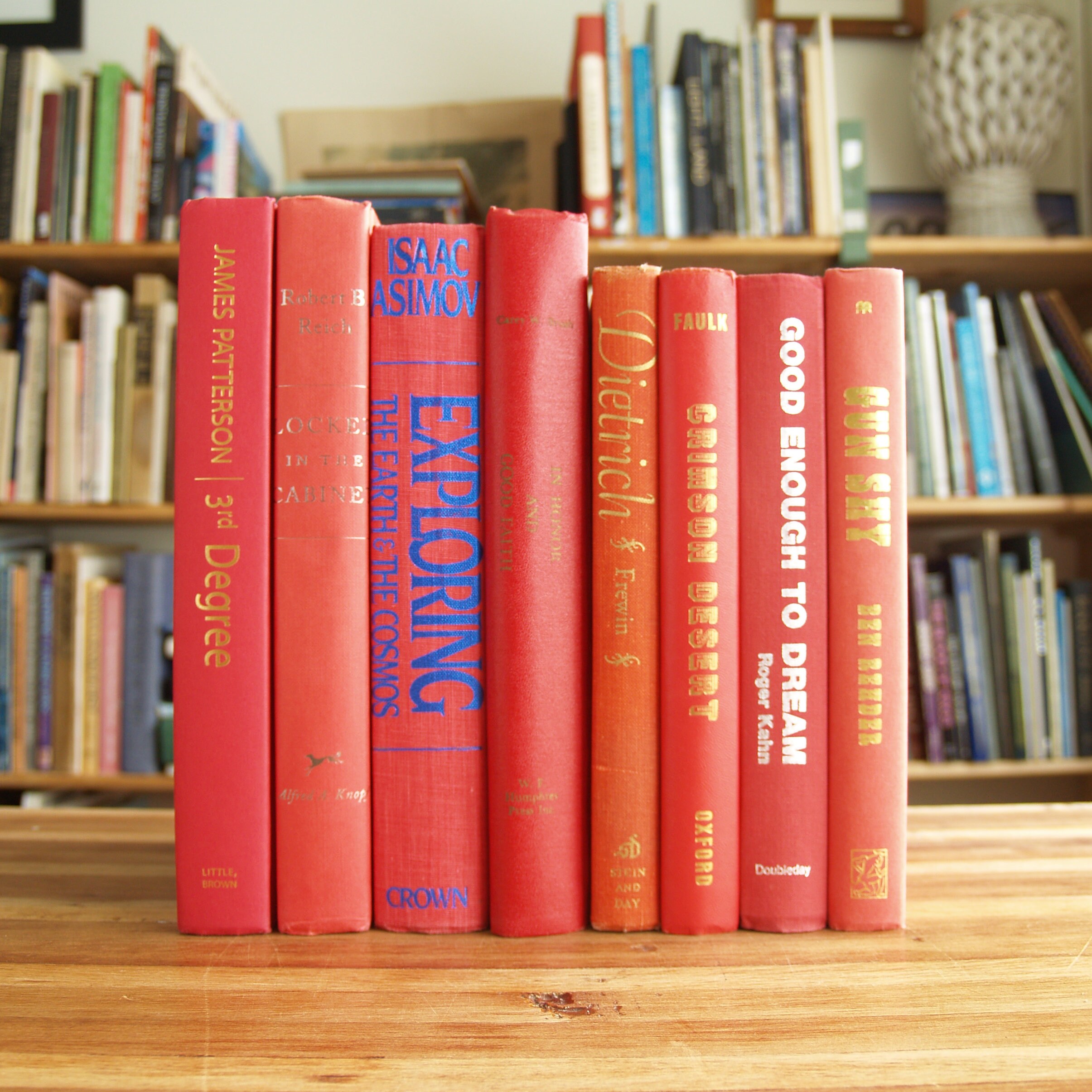 Decorative Collection of Eight Hardcover Books With Red