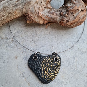 Handmade pendant, art pendant, black and gold pendant, Fimo pendant, stilized heart pendant, statement pendant, black heart pendant
