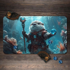 May include: A gaming mat featuring an otter character in a fantasy underwater scene. The otter, dressed in red and holding a staff and a glowing orb, is surrounded by coral, fish, and dice. The mat also includes a deck of cards with a sun design.