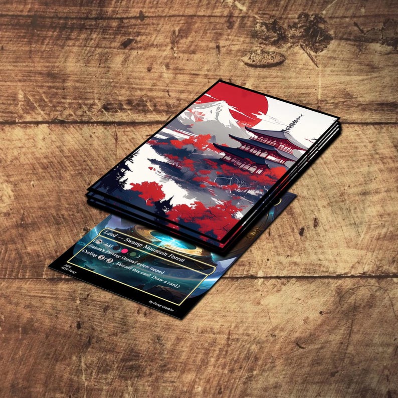 May include: A stack of illustrated card sleeves with a Japanese landscape design. The design includes a red sun, mountain, and pagoda. The bottom card shows text: Land - Swamp Mountain Forest.