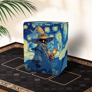 May include: A cube-shaped storage box with a wizard character set against a starry night backdrop. The wizard is depicted in a pointed hat and cloak, holding a glowing orb. The box is predominantly blue and yellow.