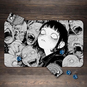 May include: A black and white manga-style illustration featuring a person with a terrified expression, surrounded by screaming faces. Includes a playmat, dice, and a card deck. The artwork is highly detailed and expressive.