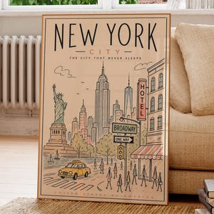 May include: A framed art print featuring a stylized illustration of New York City. The artwork includes the Statue of Liberty, skyscrapers, a yellow taxi, and the text "NEW YORK CITY - The City That Never Sleeps".