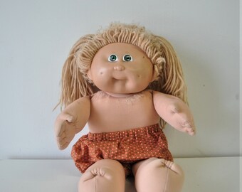 cabbage patch doll heads