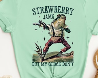 Strawberry Jams But My Glock Don't T-Shirt , Western Funny Frog T-Shirt, Funny Meme Shirt ,Birthday Shirt, Halloween Gift
