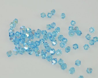 50 Aquamarine AB Swarovski Crystals - 4mm Bicone