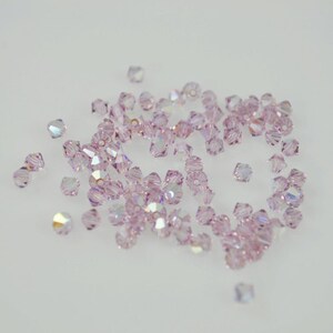 50 Light Amethyst AB Swarovski Crystals - 4mm Bicone