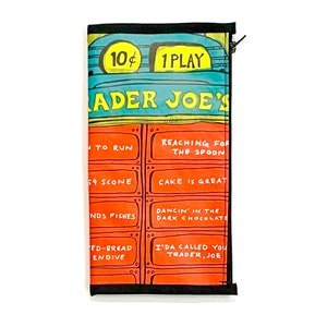 May include: A red and orange zippered pouch with a black border. The pouch has a cartoon illustration of a vintage arcade game with the text "10¢ 1 PLAY TRADER JOE'S" and various food-related phrases.