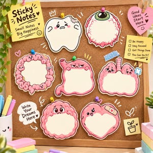 Puede incluir: Una colección de notas adhesivas con motivos anatómicos fijadas en un tablero de corcho, que incluyen ilustraciones de un diente, un globo ocular, intestino, estómago, pulmones, cerebro y corazón, junto a notas cuadradas y en forma de corazón.