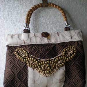 Quilted satin purse with beading trim image 1