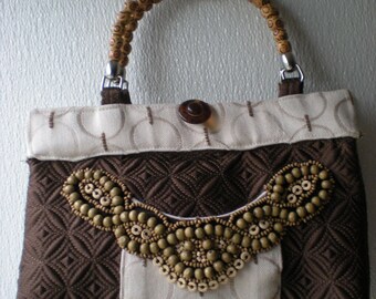 Quilted satin purse with beading trim