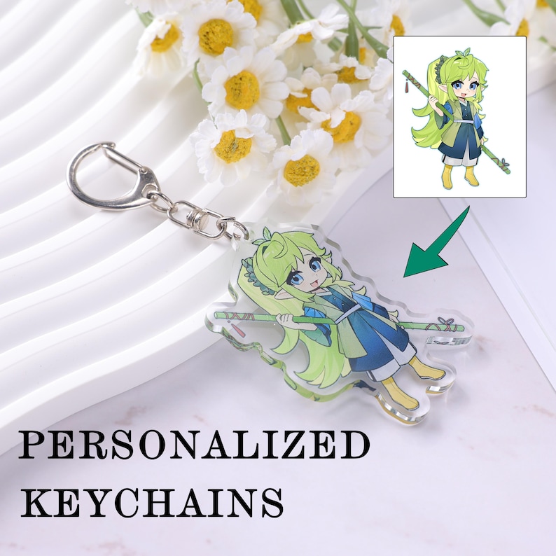 May include: A clear acrylic keychain featuring a cartoon character with green hair and blue clothing, holding a bamboo staff. The keychain is attached to a silver metal clasp. The text "PERSONALIZED KEYCHAINS" is below the keychain.