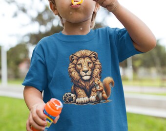 May include: A young boy wearing a blue t-shirt with a lion and squirrel graphic blows bubbles with a yellow bubble wand.