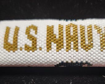 Funda para encendedor con cuentas hechas a mano de la Marina de los EE. UU.