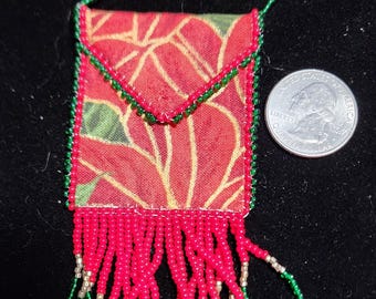 Bolsa de flores de Pascua hecha a mano con cuentas