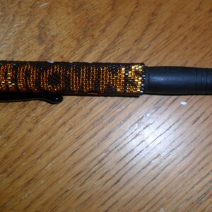 BROWNS Hand Beaded Pen Wrap image 1